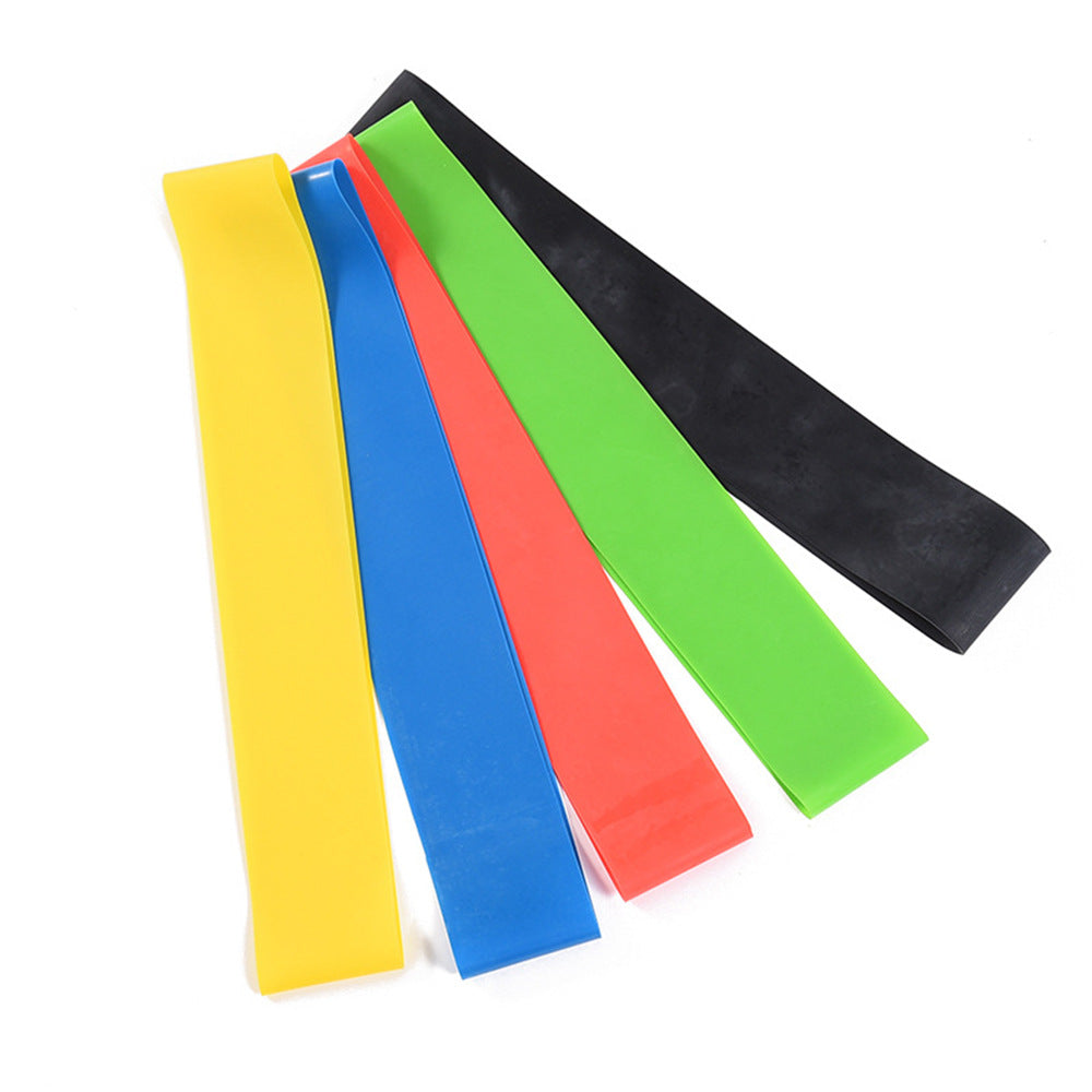 Set of colorful resistance bands on a white background